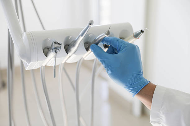 Professional Invisalign Clear Aligners technician working in Wake County County, NC